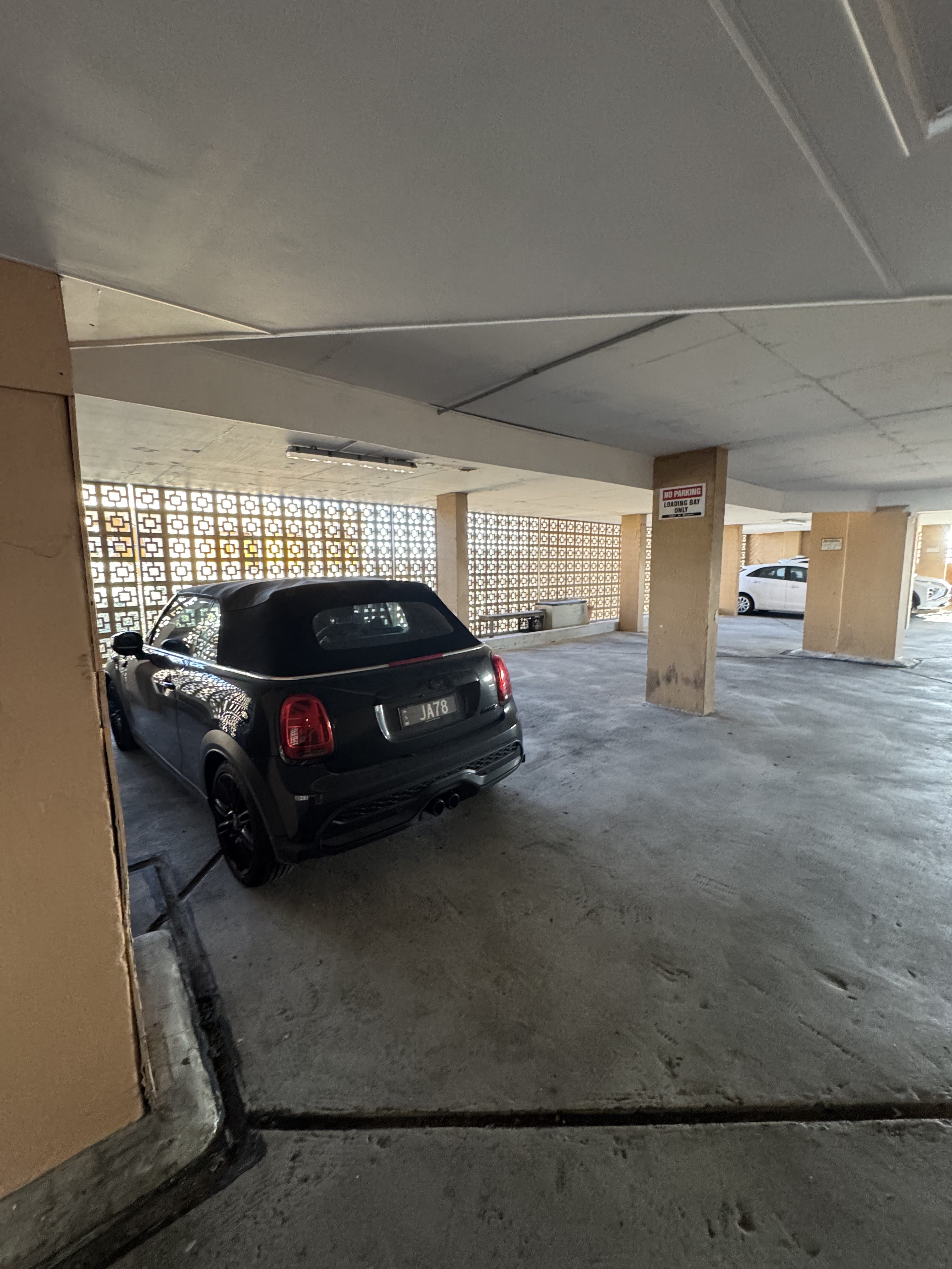The two loading bay spaces beside the lift in the car park