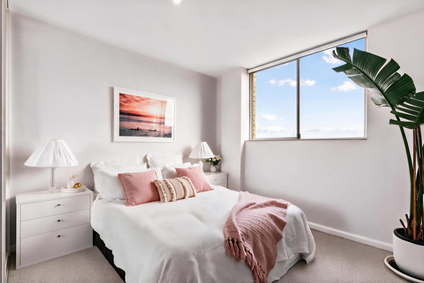 Main queen bedroom with ocean views in the North Bondi holiday apartment