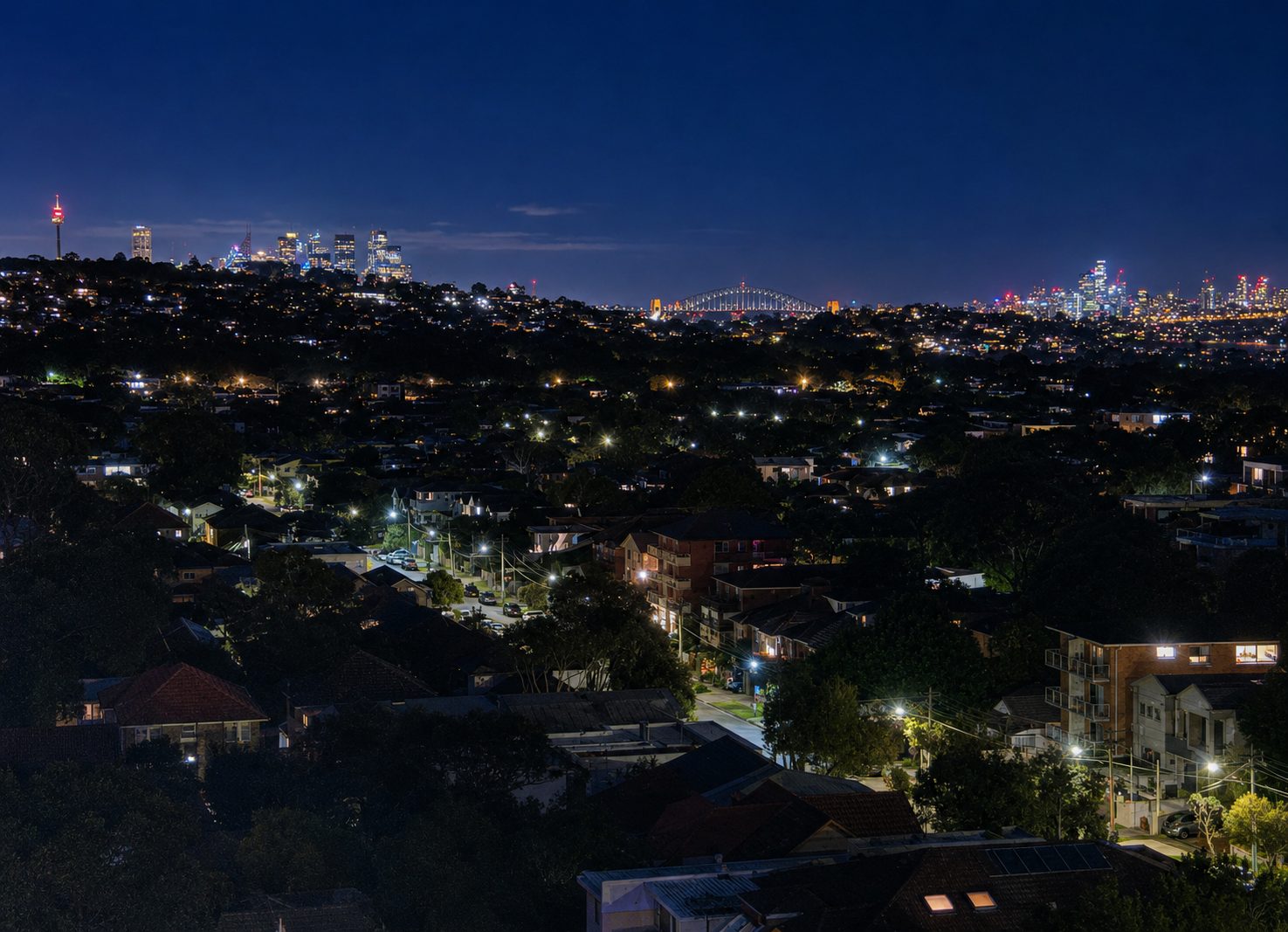 The Sydney skyline at night seen from North Bondi